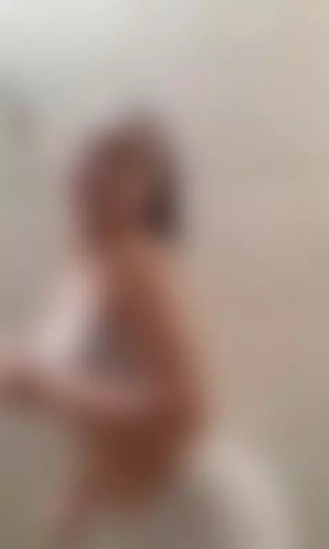 Latina dancing before the shower by liladior