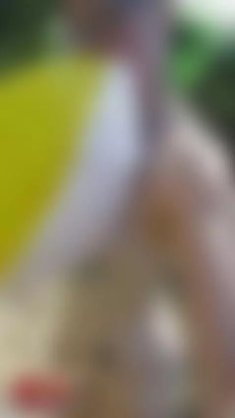 Blowing up my beach ball outside - hope nobody sees me! by visceralvixen69