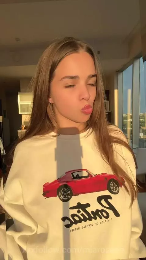 18+ Sexy pout from brunette in tight Porsche sweatshirt. by miaroseee