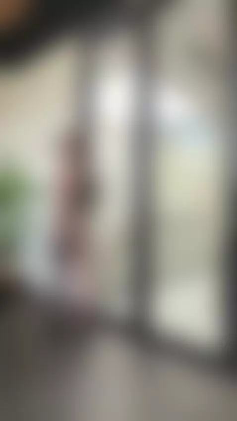 Tattooed girl teases in lingerie by the glass door by jadiexbaddie