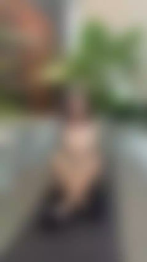 Tattooed body sits cross-legged with eyes closed by jadiexbaddie