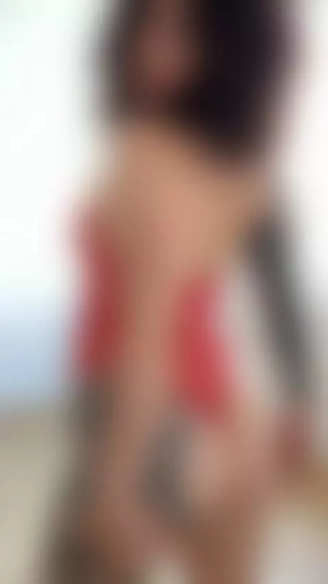 Curly tattooed babe in fishnet bodysuit by jadiexbaddie