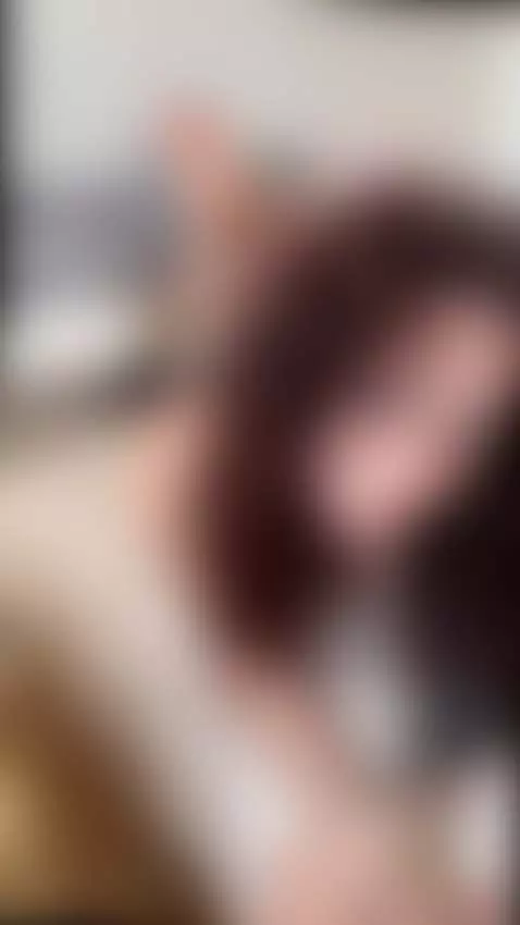 girl in bed with legs up looking at camera by jadiexbaddie