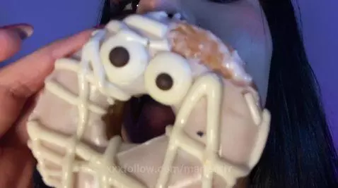 My tongue sinks into the donut, imagining something else by mariagrrr