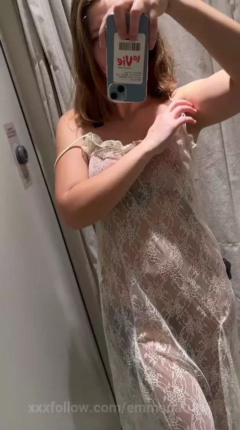 The girl shows herself in the fitting room by emmanatural
