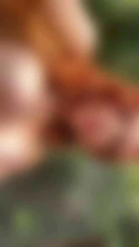 18+ Redhead's perky nude tits teasing outdoors. by adelka2003