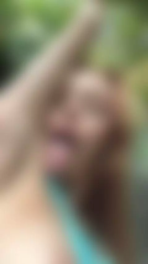 18+ Redhead's sexy tits peek through blue top, tongue teasin... by adelka2003