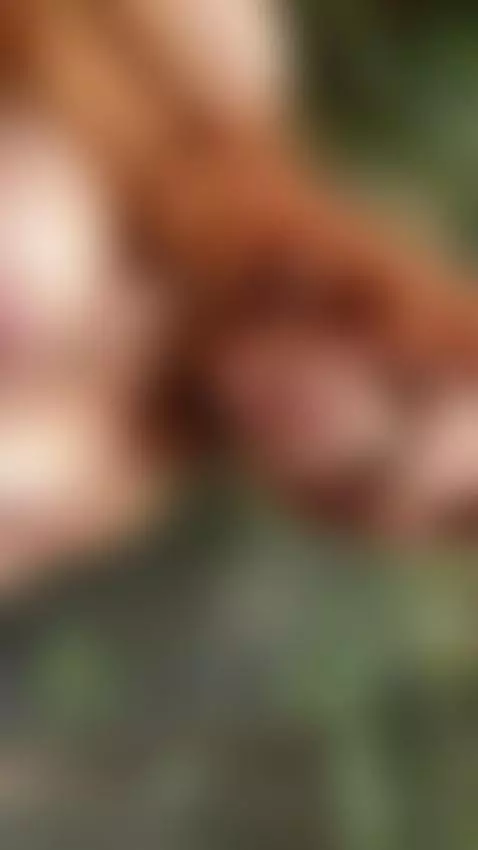 18+ Redhead's perky nude tits with pink nipples teased outdo... by adelka2003