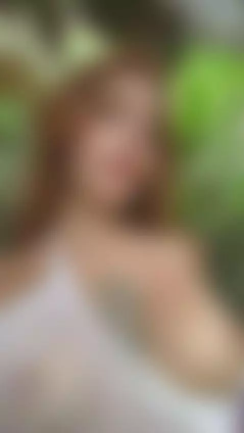 18+ Redhead's perky nude tits in sheer mesh, tongue out. by adelka2003