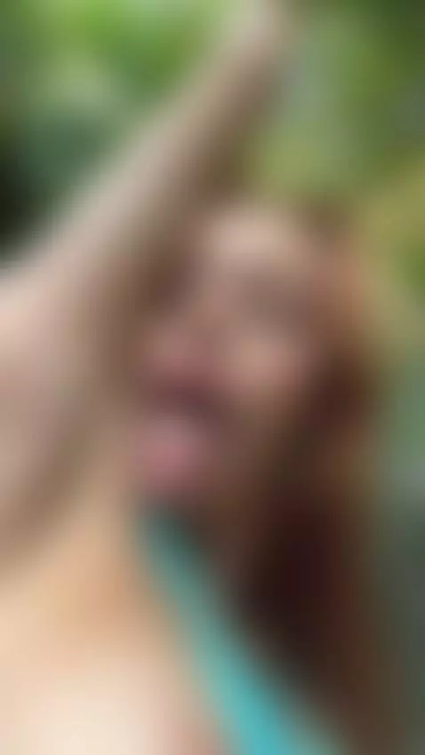 18+ Sexy redhead's perky tits and teasing tongue out. by adelka2003