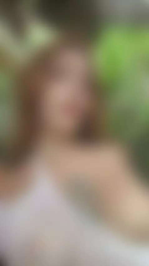 18+ Redhead's perky nude tits in sheer mesh, tongue teasing. by adelka2003