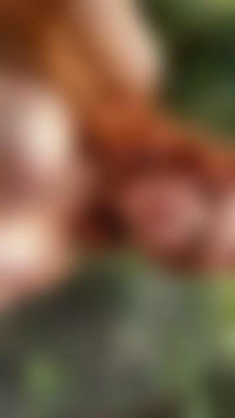 18+ Redhead's perky nude tits in wild greenery. by adelka2003