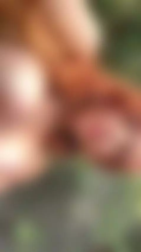 18+ Redhead's perky nude tits in wild greenery. by adelka2003