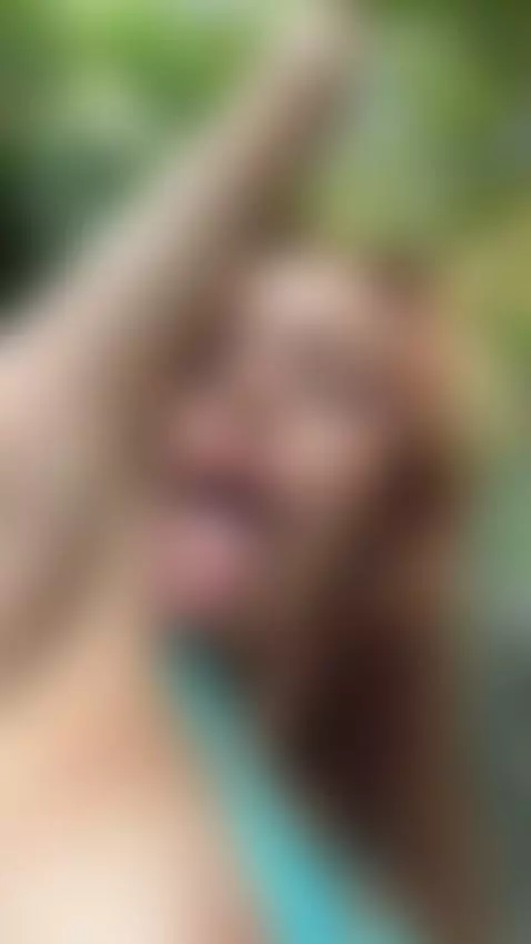 18+ Redhead's tongue tease, perky tits spilling from blue to... by adelka2003