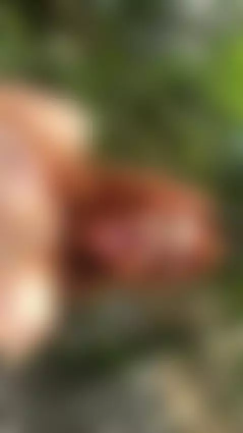 18+ Redhead's perky nude tits and teasing tongue outdoors. by adelka2003