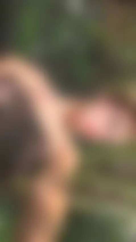 18+ Redhead's sheer nude tits tease in garden glow. by adelka2003