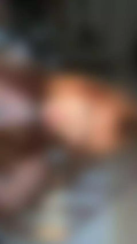 18+ Sexy redhead pouting with perky tits in choker tease. by adelka2003