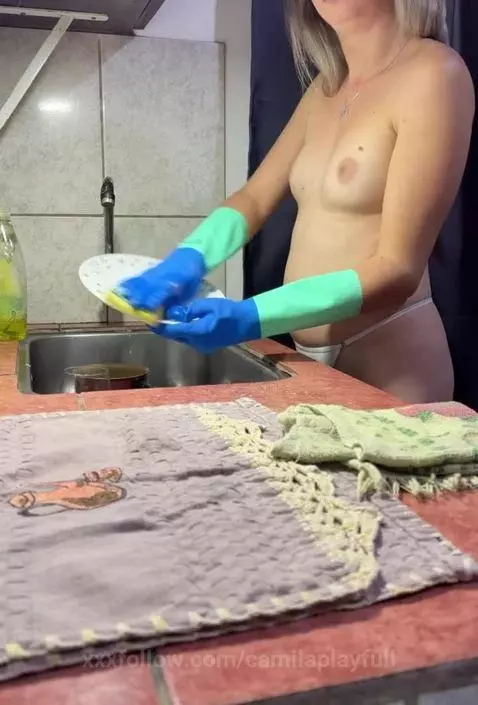washing dishes in rubber gloves by camilaplayfull