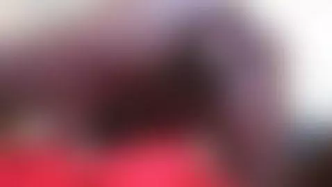 toy hanging by pebbles-rubble