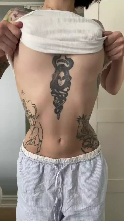 Inked goddess: dark beauty 🎭 Tattooed perfection, magnetic p... by ladydirt