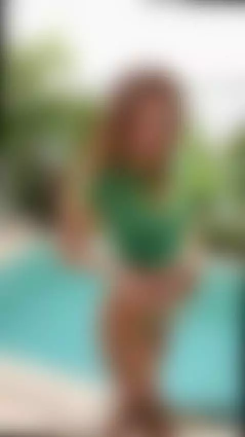 Lifting shirt, teasing curves by poolside. 🥵 by gingertee