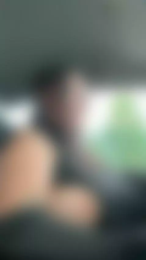 18+ Busty tattooed tits spilling out in car. by bettybong