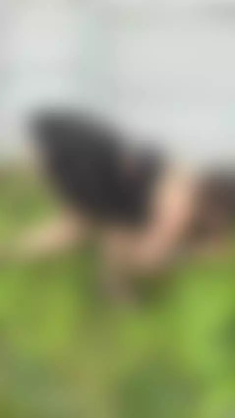 18+ Sexy tattooed ass bent over in grass. by bettybong