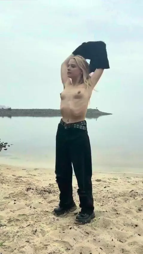 18+ Topless blonde's small nude tits on beach. by crazylexi