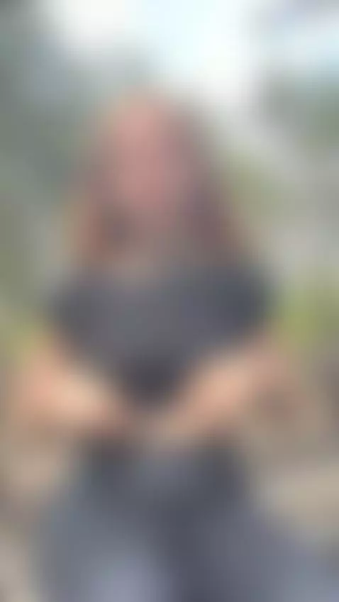 18+ Redhead lifts top, bares perky nude tits outdoors. by crazylexi