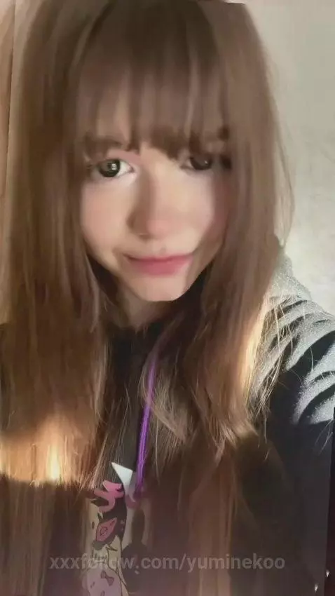 18+ Sexy brunette babe with bangs flashing a flirty smile. by yuminekoo