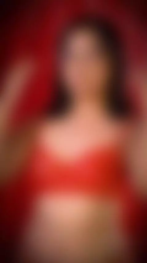 Cute Latina in red lingerie stripping down to her tits for t... by casa-salsa