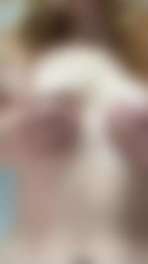 18+ Nude redhead cups perky tits, spreads for sexy pussy. by ravelilyxo