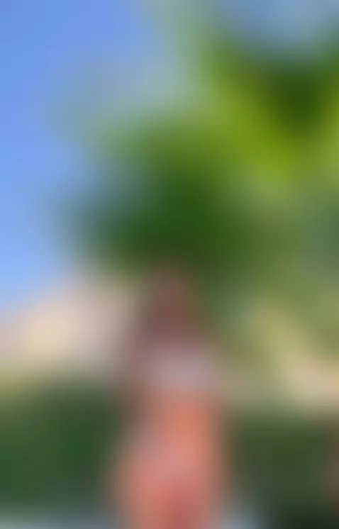 slipped my top down while lounging by the palm trees in the ... by selenalyy