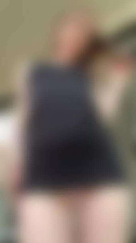 Short black dress tease reveals a glimpse of pink lace panti... by katequinnxxx
