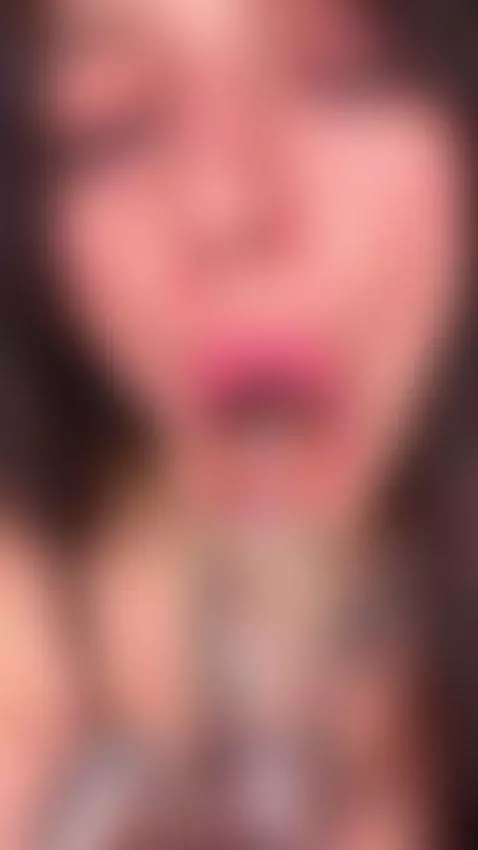 She wraps her lips around a thick toy and looks straight at ... by emmyelfie