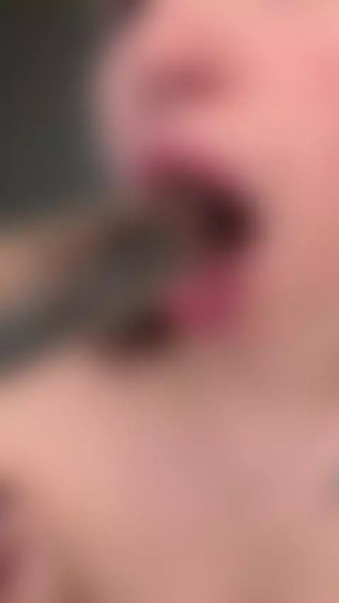 Slick clear toy sliding deep into an open wet mouth in extre... by emmyelfie