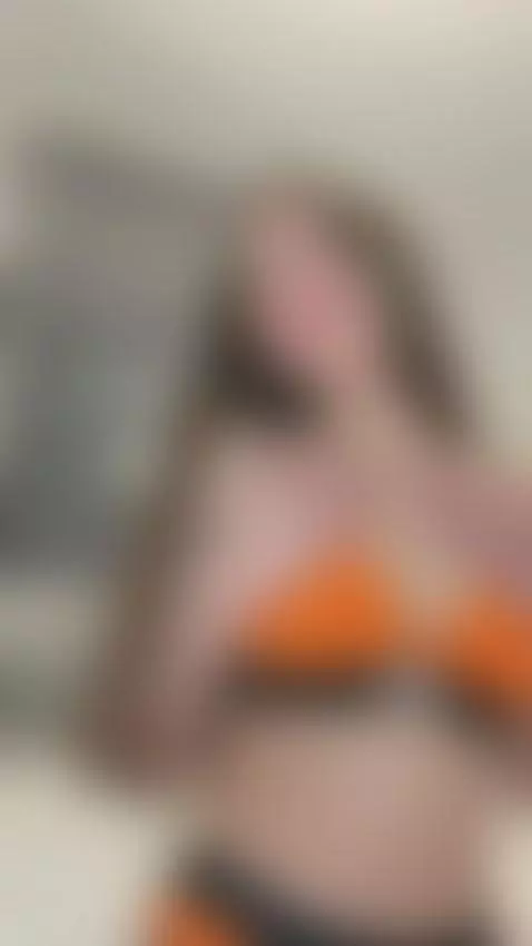 18+ Sexy long-haired babe teasing perky tits in orange bikin... by esthergrace23