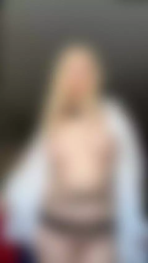 She teases with bare tits and spread thighs by missfrogg