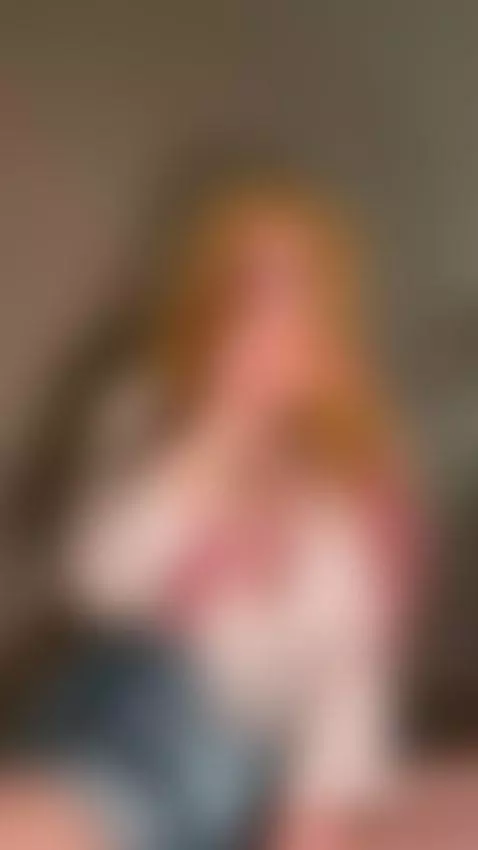 Blonde hair frames her face as she teases with one finger up... by missfrogg