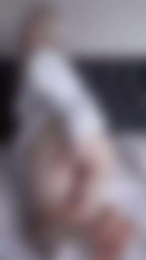 Blonde hair drapes as she cups her ass on the bed 😈 by sanderslina