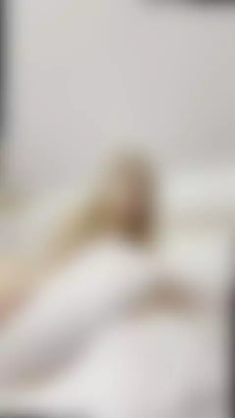 Nude legs spread wide on the sheets by spicyinnna