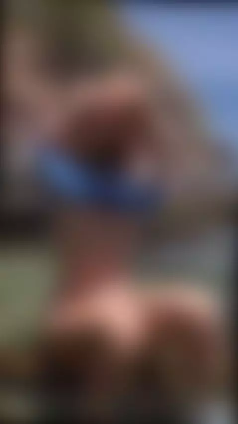 Wet pussy glistens as she squats in shallow waves 😇 by ellynextdoor