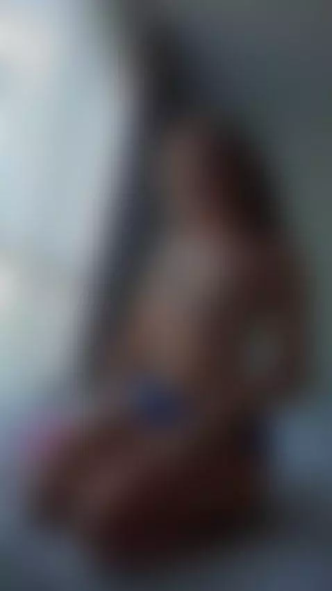 Bare chest forward as she sits on the bed smiling 💕 by ellynextdoor