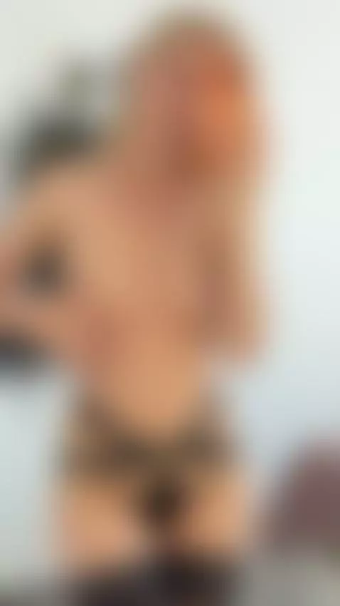Blonde tease flaunts her curves in strappy harness lingerie by siareal
