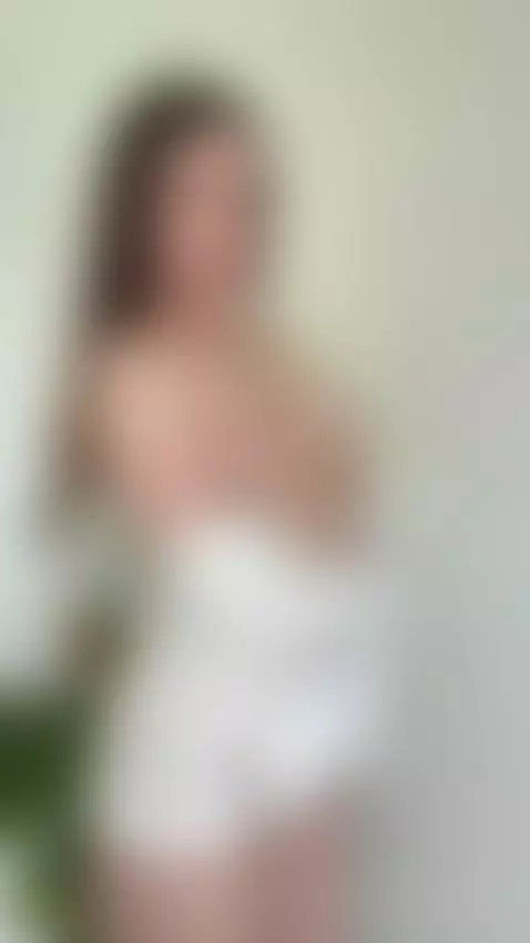 Slim brunette flashing her natural tits in a white shirt by missshellystar