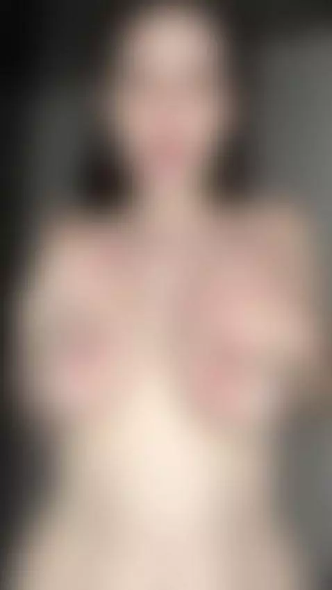 That subtle seductive smile while my hands free my heavy tit... by monicawolf