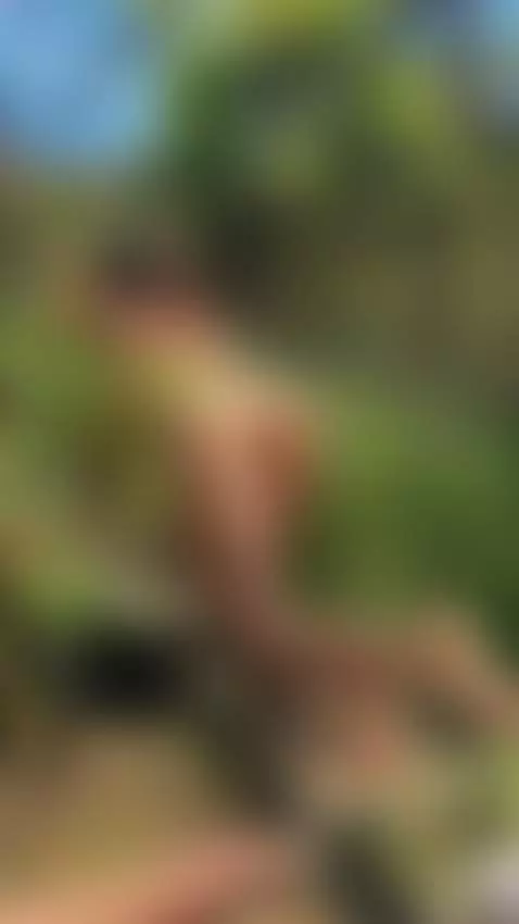 Seductive fishnet stockings and topless pose in nature. Watc... by moniiik