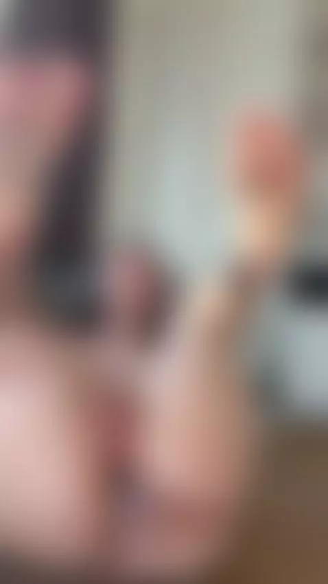 Brunette with legs thrown high, fucking her dripping ass wit... by elliebunnys
