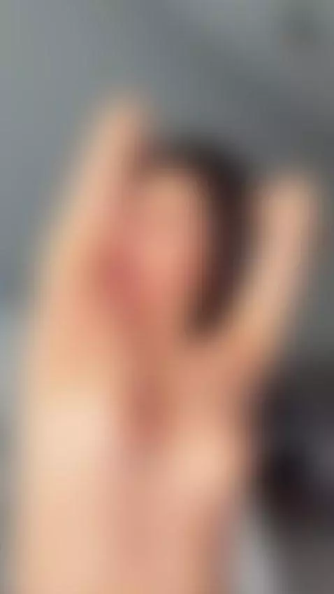 Shiny wet skin and natural breasts as she plays. Onlyfans by licalicalica