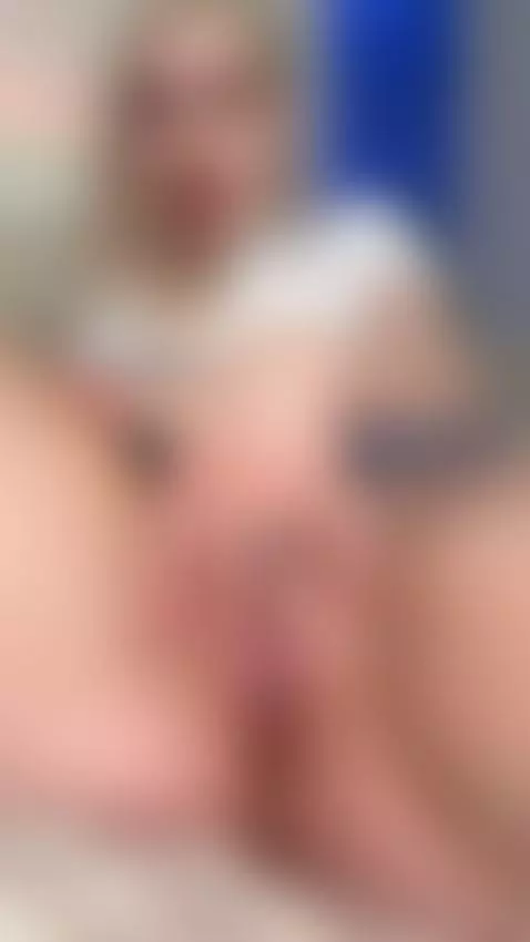 Blonde thighs spread wide as she fingers herself slow by slinkxox